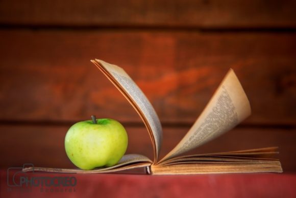 Apple on Book: A Creative Icon for Designers